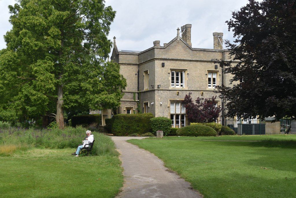 The Victorian house of Cherry Hinton Hall seen across its park
